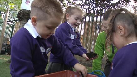 StM Recpt children holding compost
